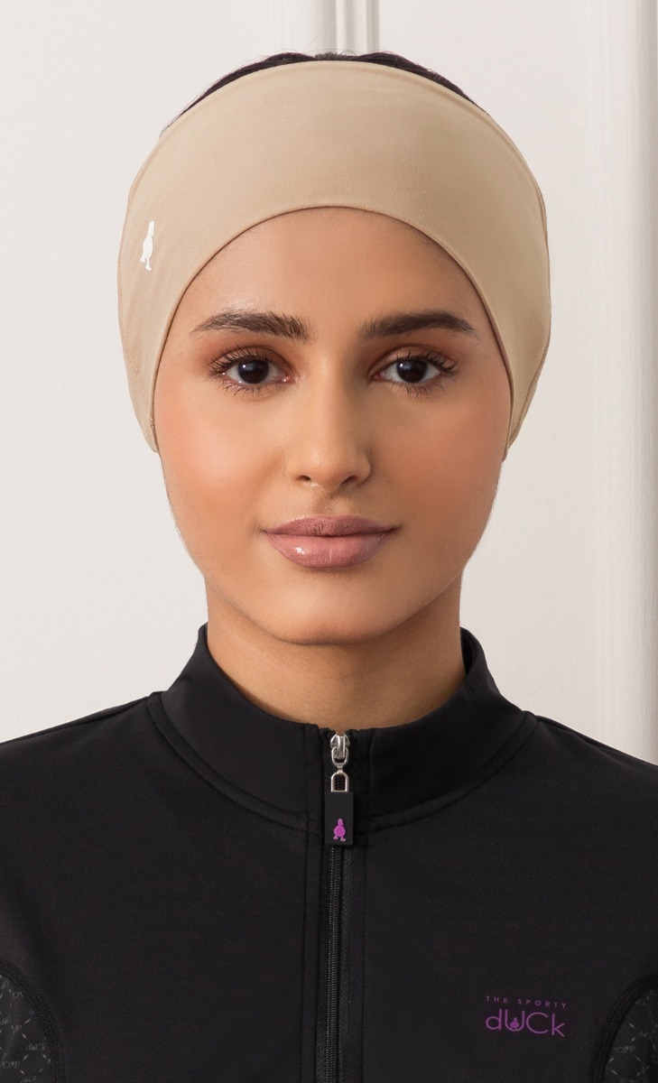 The Sporty dUCk Performance Headband in Nude image 2